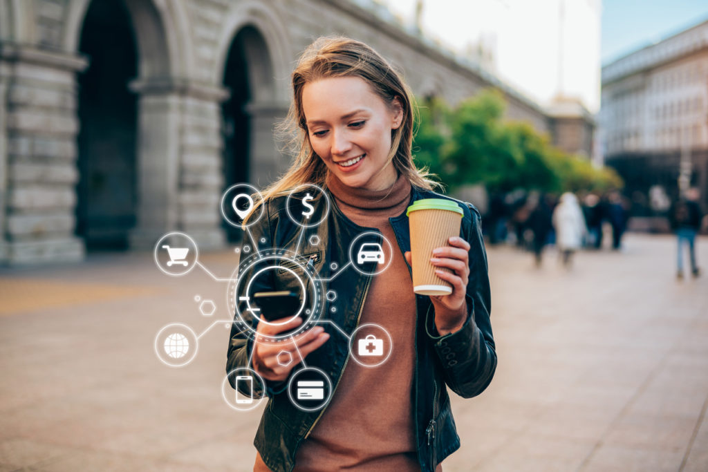 Young woman using mobile apps